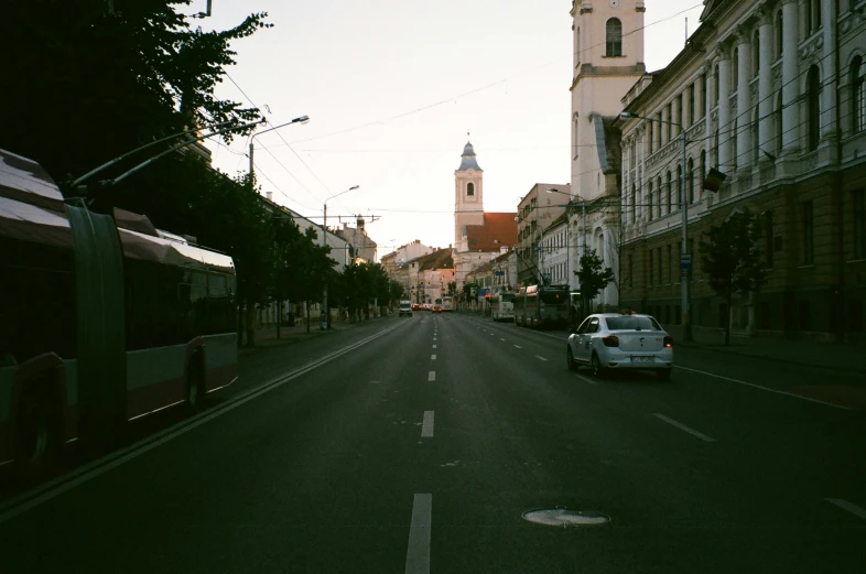 cars parked on the side of a city street