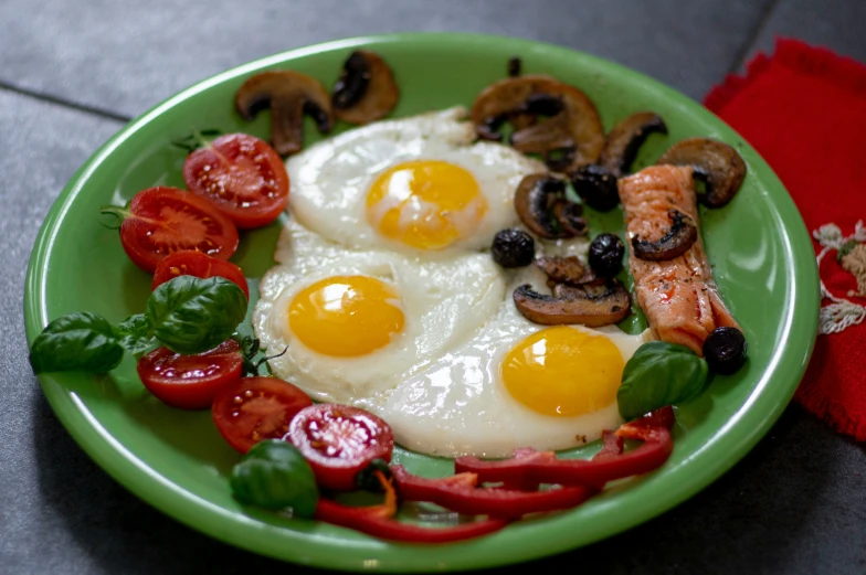 a plate with some food and vegetables on it