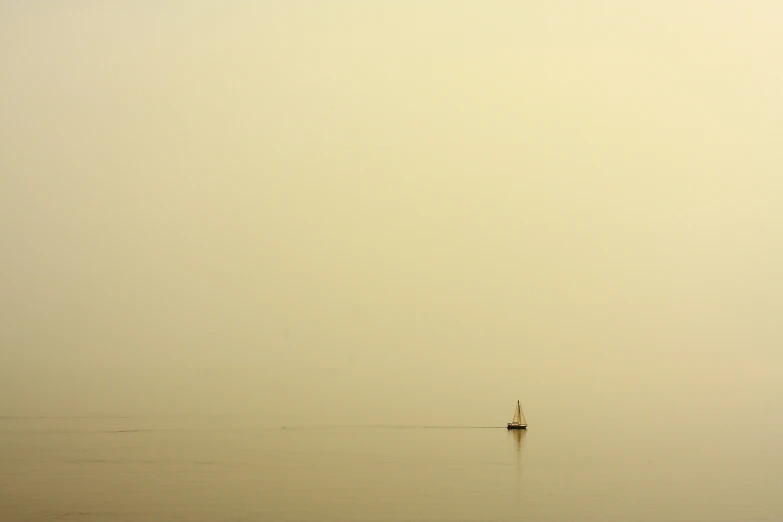 two people riding on the backs of a boat