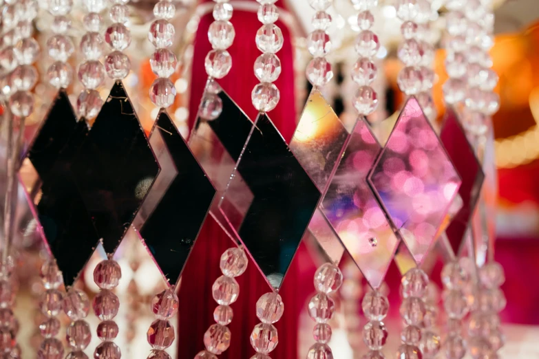 a group of colorful objects hanging on the wall