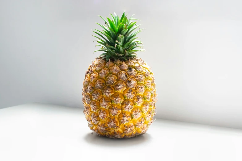 a pineapple standing up and wearing a crown