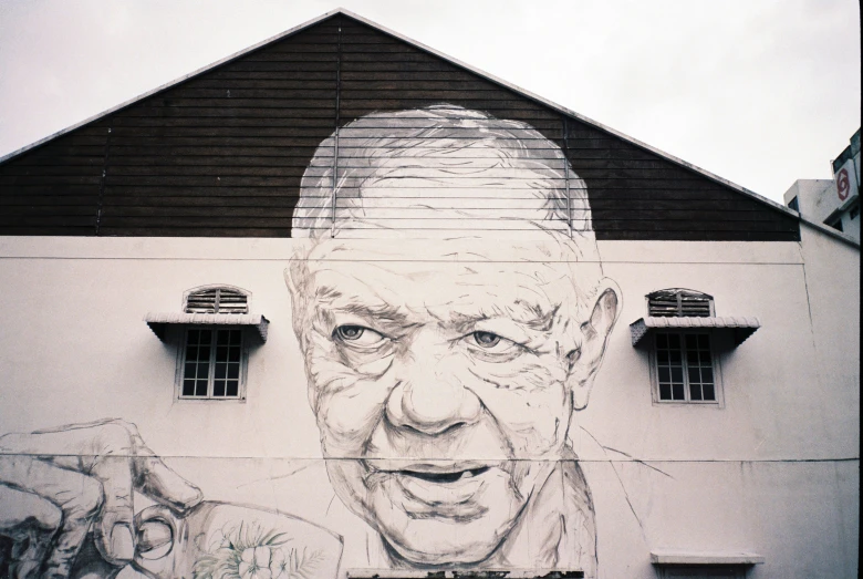 this is the wall painting on a building of a man