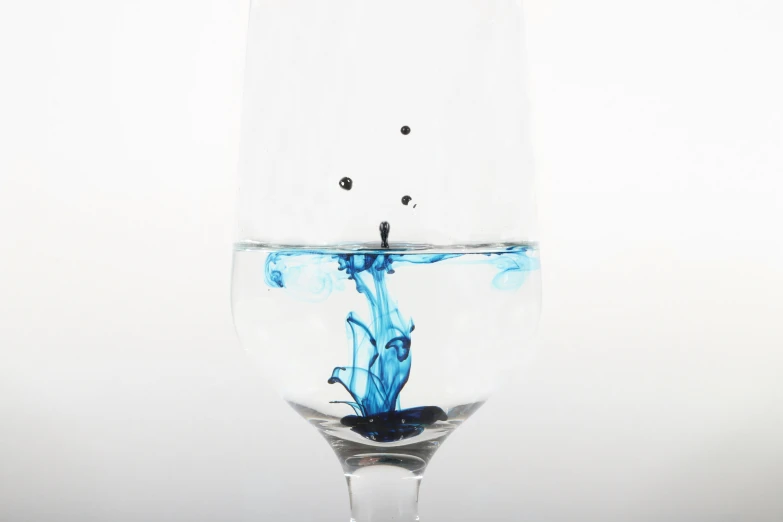 this is a glass with water inside it