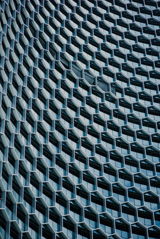 an abstract building made up of windows with no shutters