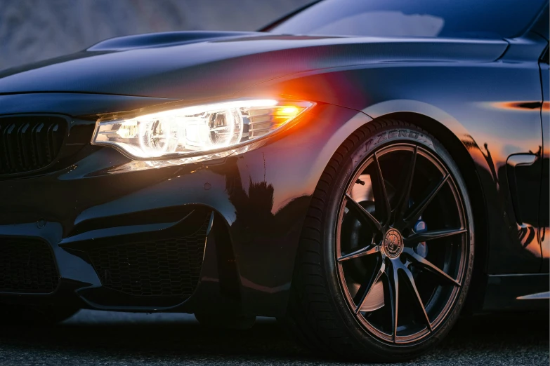 the front lights and ke parts on a black car