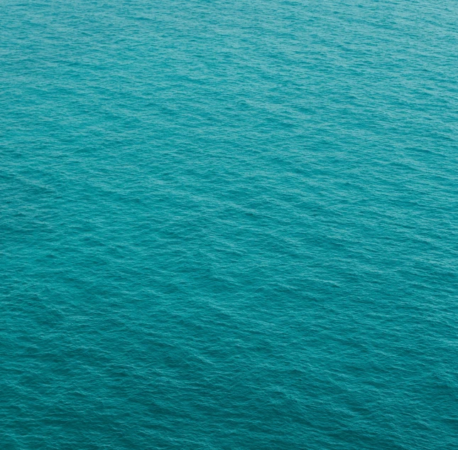 an airplane flying over a body of water