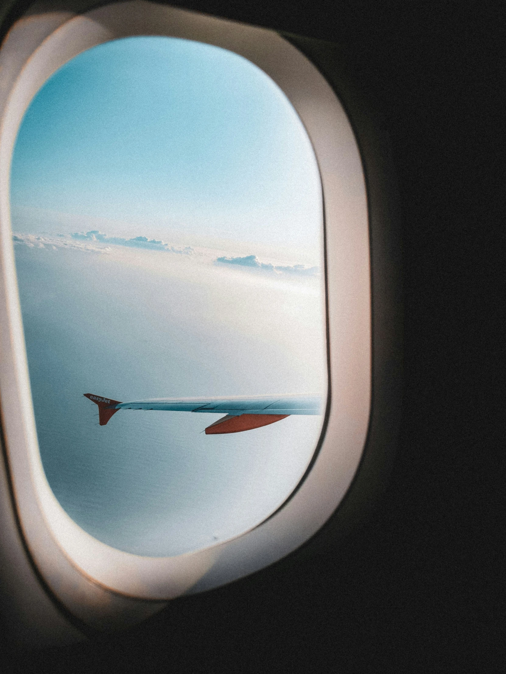 a plane's windows during flight are clear