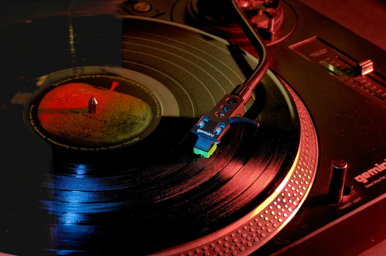 a turntable with record disks in the room