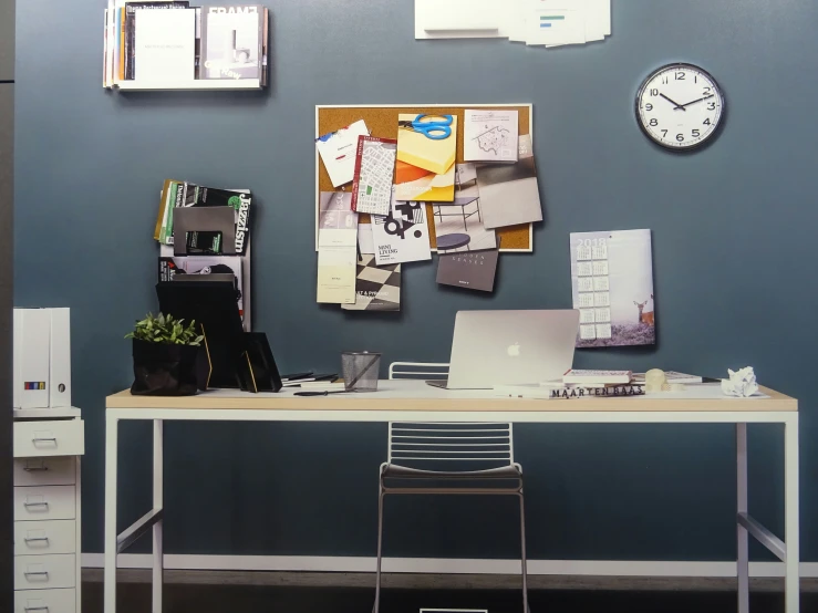 a desk is covered with many different items