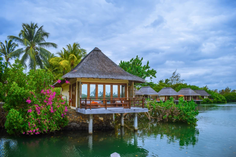 a small dock with some chairs on it