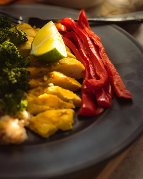 a plate of cooked food including broccoli and shrimp