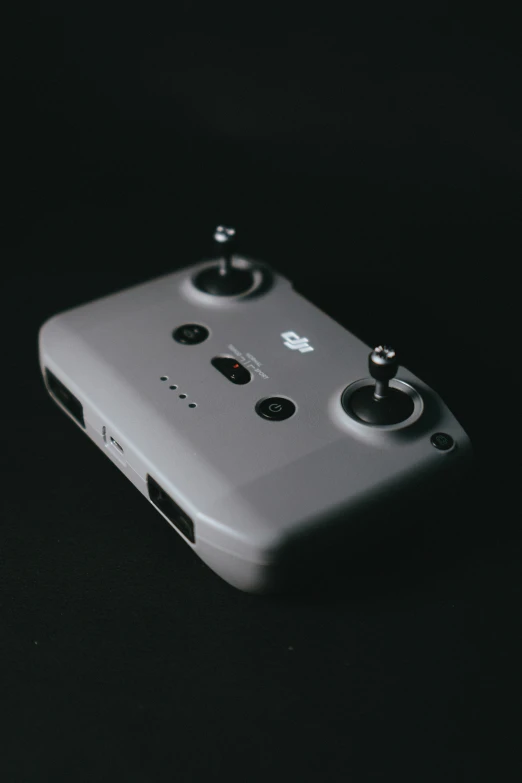 a grey and black po of a game controller