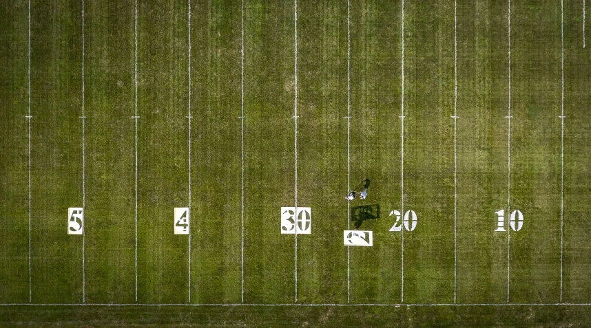 an aerial view of soccer field with two lines and twenty hundred and fifty