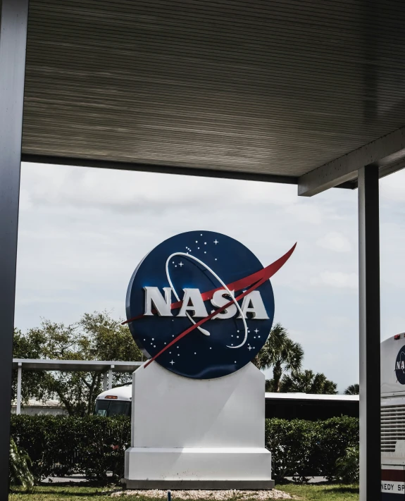 a nasa sign is shown under the pergolate