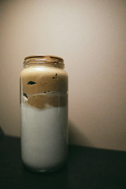 the jar has been decorated with pictures on it