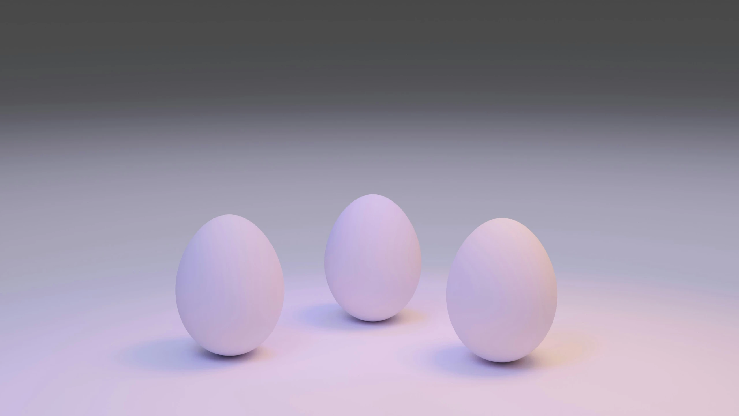 three white eggs sitting next to each other