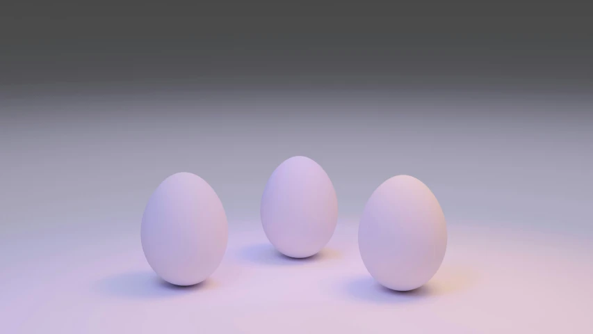 three white eggs sitting next to each other