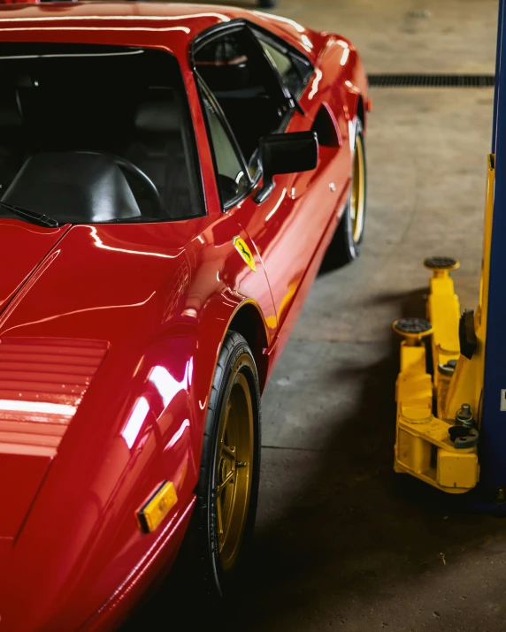 the rear end of a red sports car