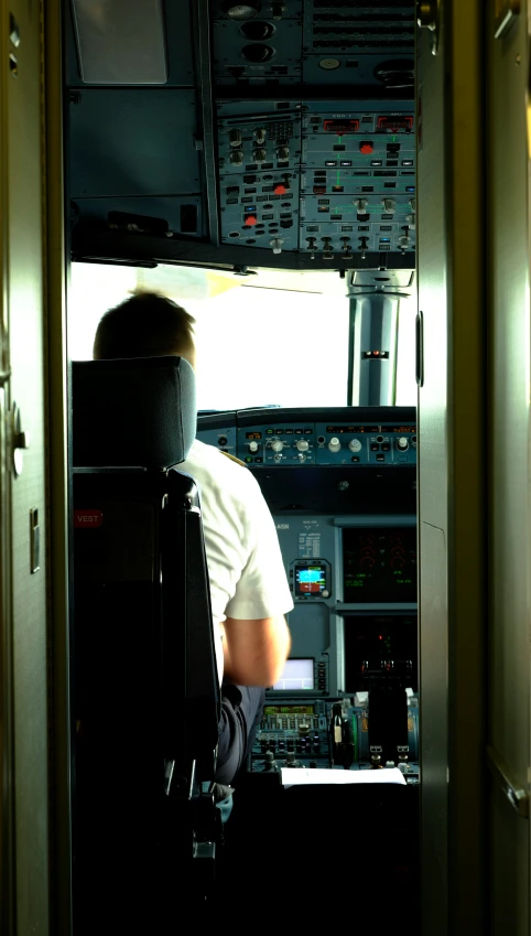 view from a cockpit looking at the controls