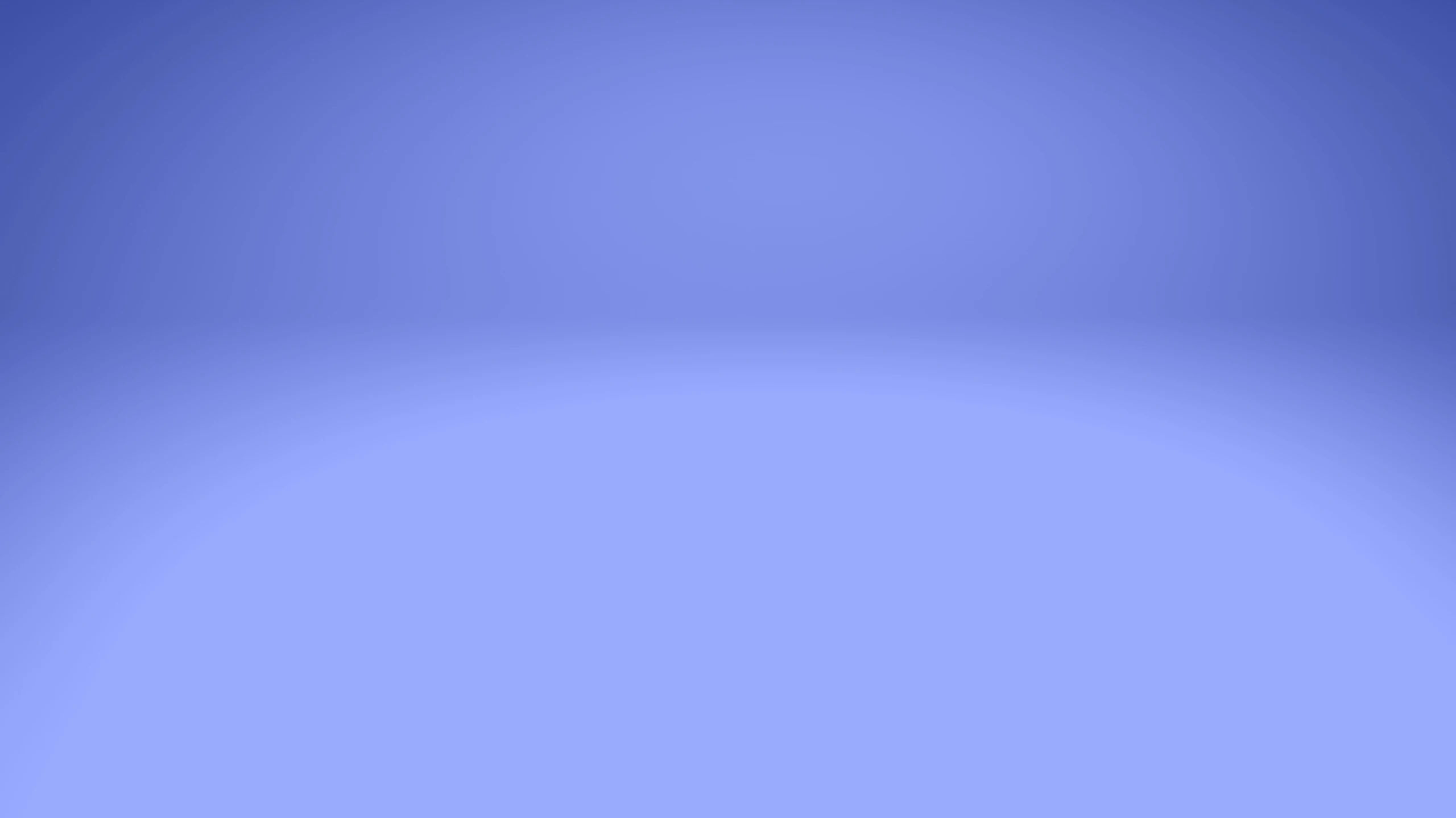 an orange is sitting on a blue background