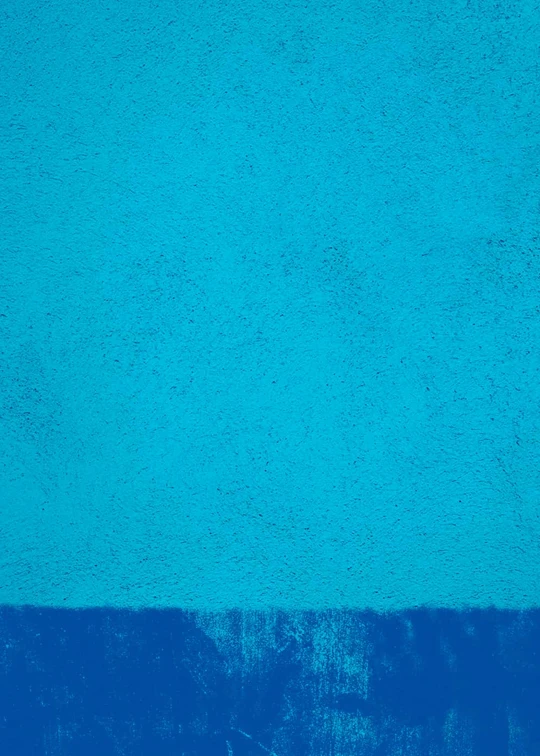 a single blue object is positioned on a blue surface