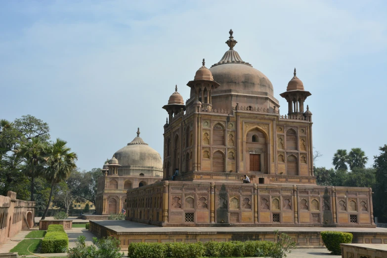 a building made from bricks and with domes