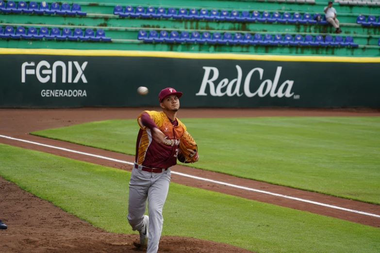 a pitcher is throwing the baseball to a batter