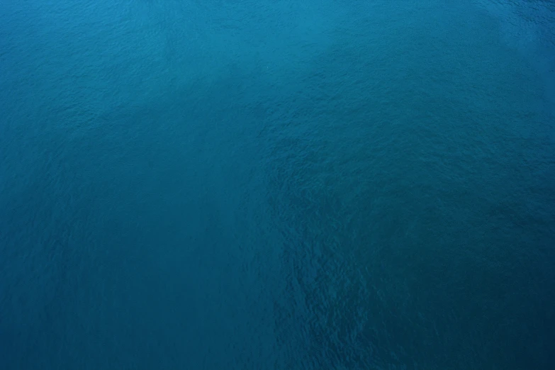 an image of blue wall paper textured with lots of patterns