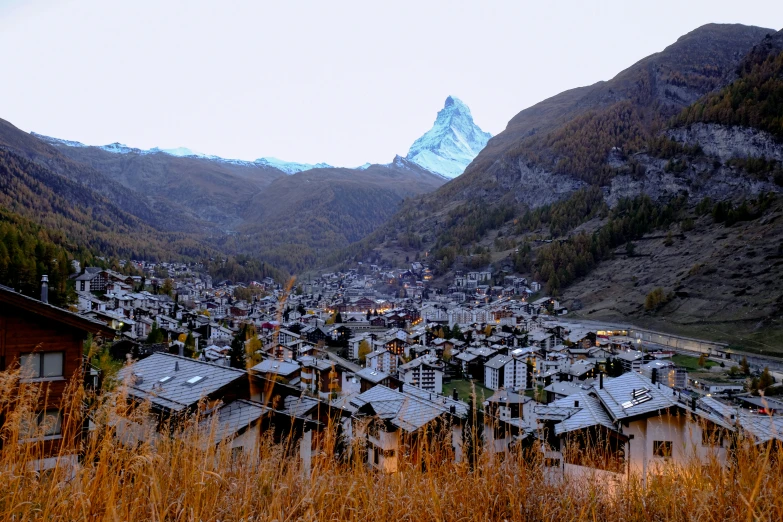 a view of a large village in the mountains