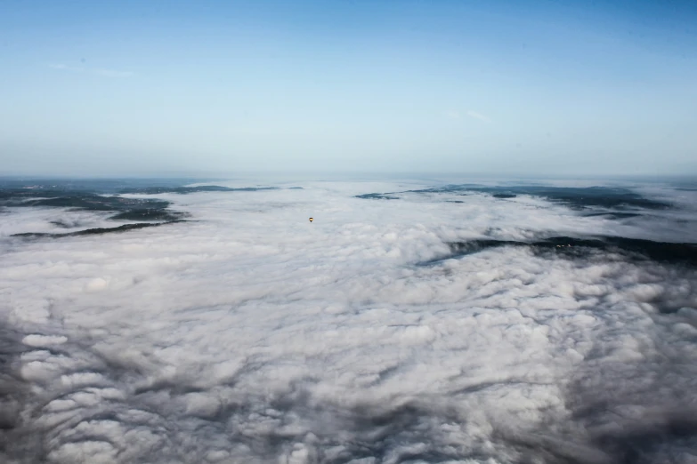 a large amount of clouds are floating in the sky