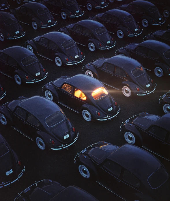 a group of black cars all parked together