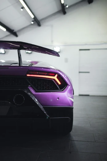 a purple car that is in a room