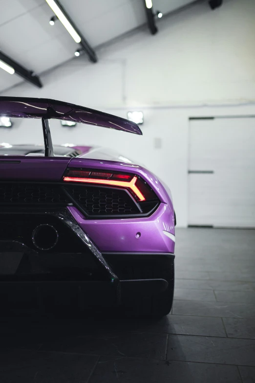 a purple car that is in a room