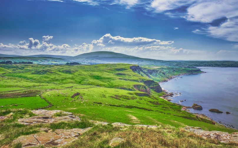 a beautiful valley overlooks a body of water