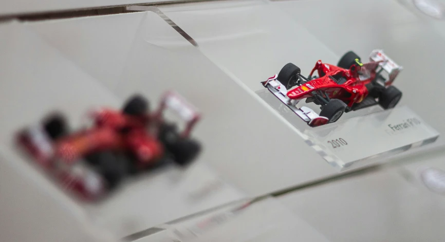 an abstract picture shows toy cars being displayed