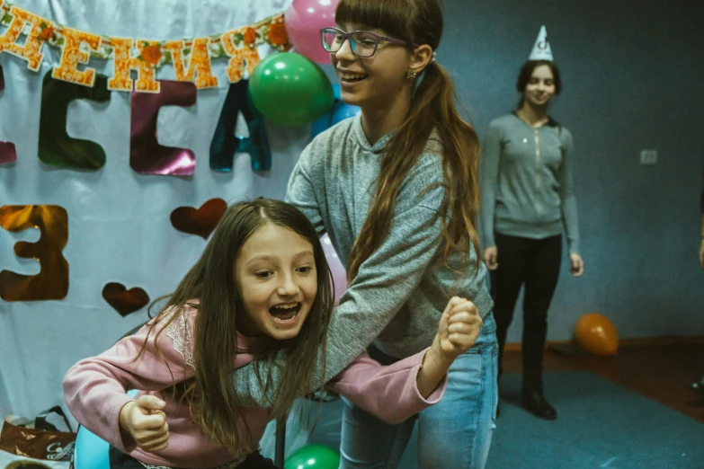 two s dance during a birthday party