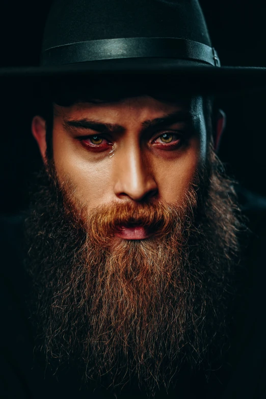 a close up image of a man wearing a top hat