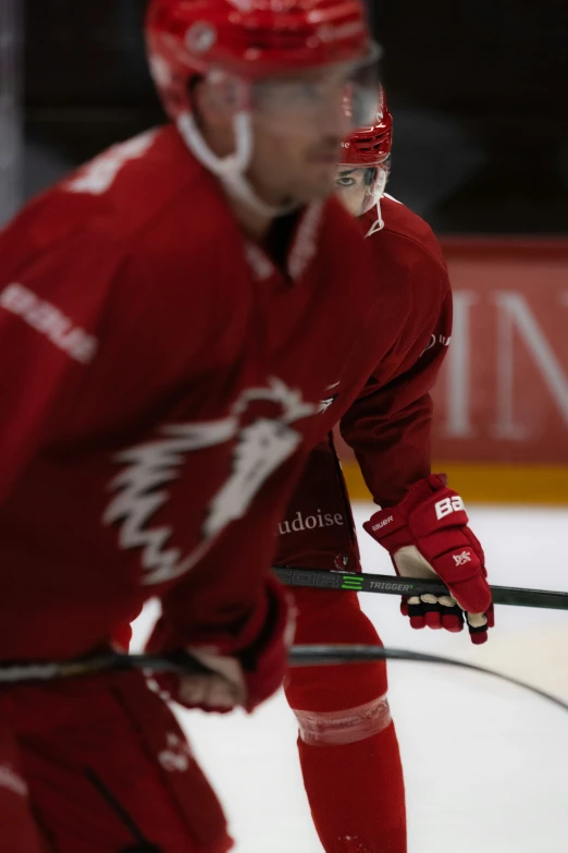 a hockey player in red on the ice