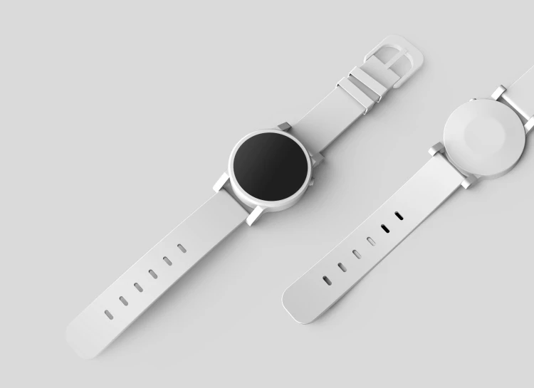 two smart watches are shown on a white surface