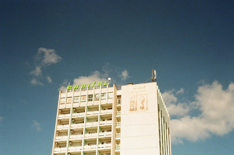 a large white building with words on the side