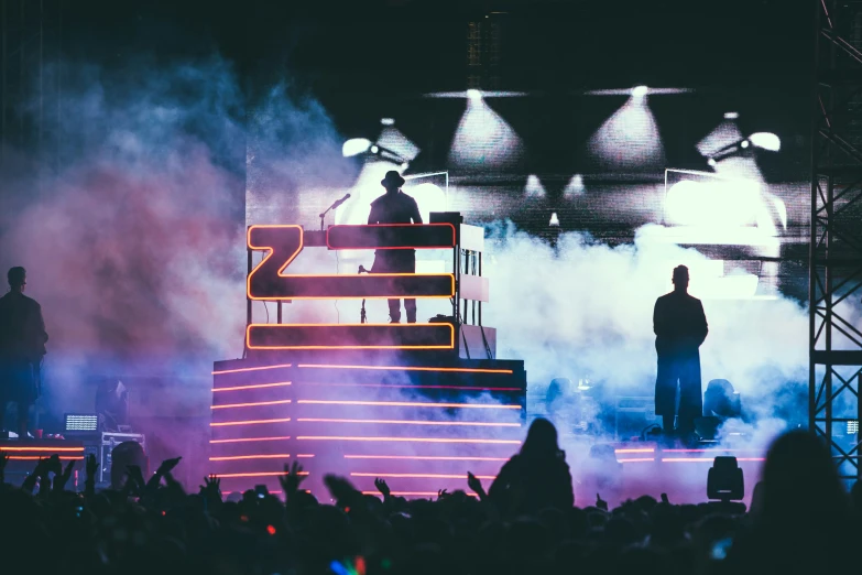 a person standing on top of a stage