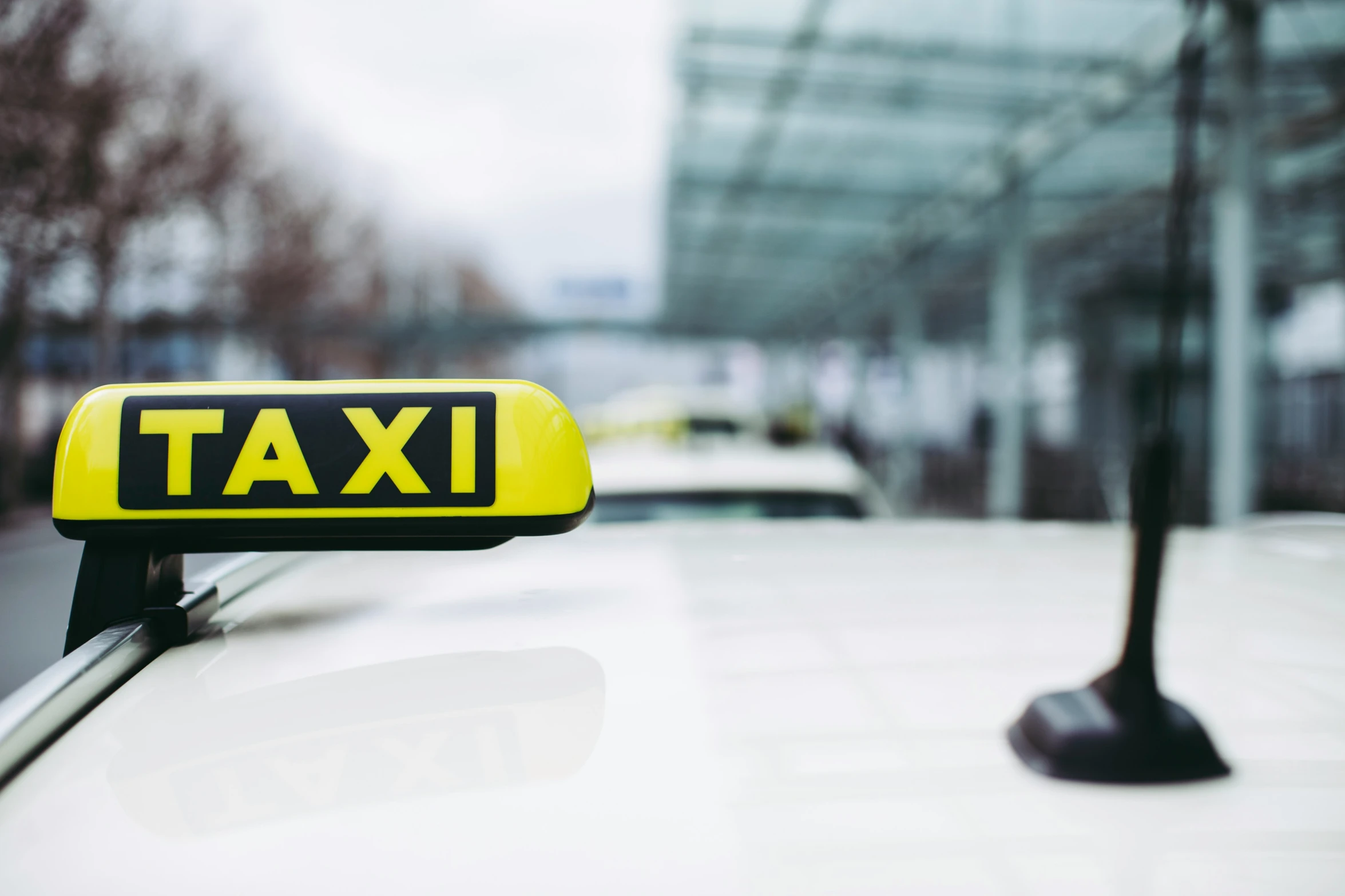 a taxi cab with a yellow cab sign that says taxis