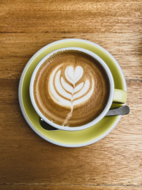 a cappuccino with some writing on the top