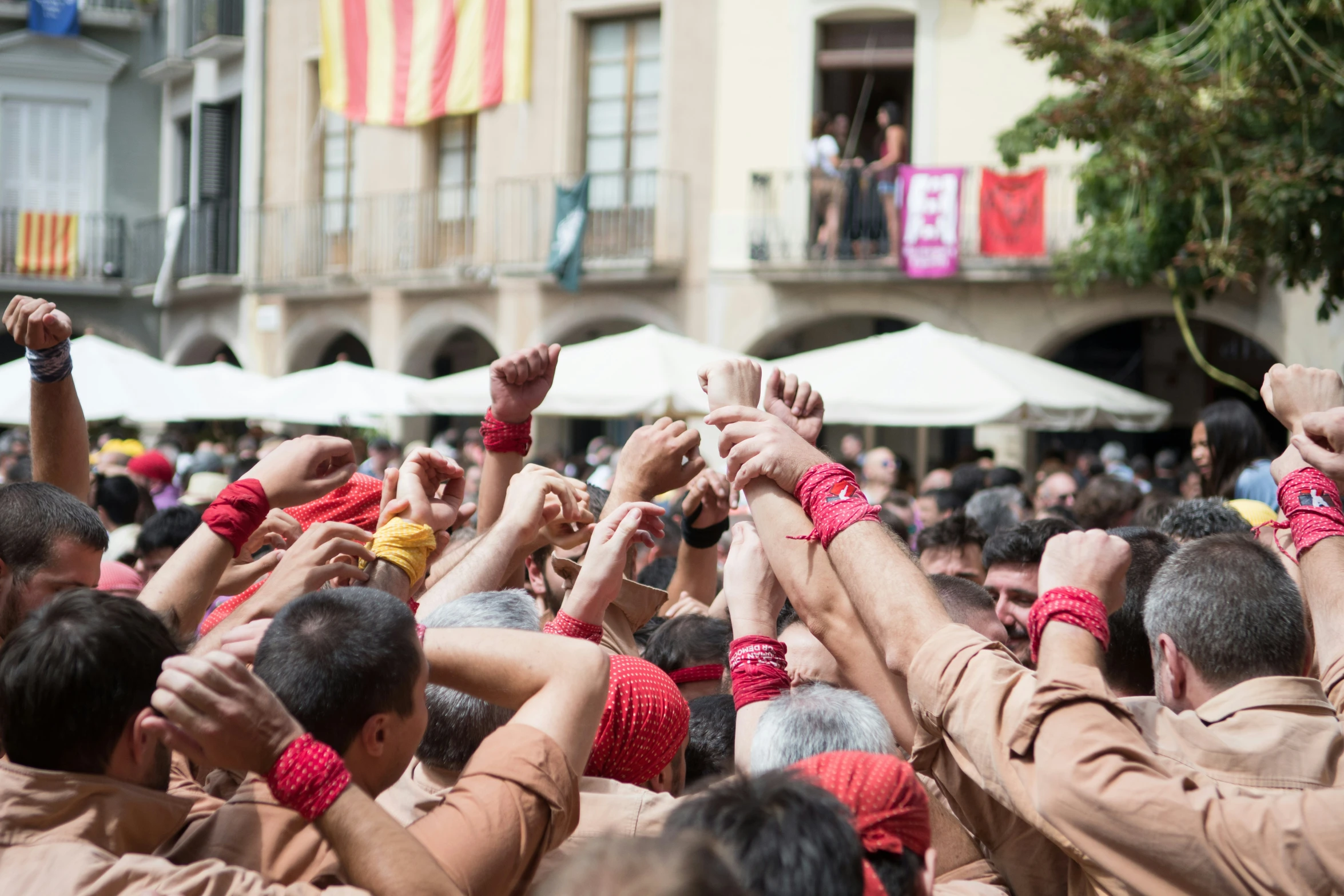 a crowd of people in uniforms standing around each other