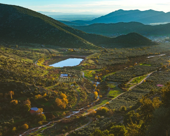 this is an aerial view of a valley and lakes