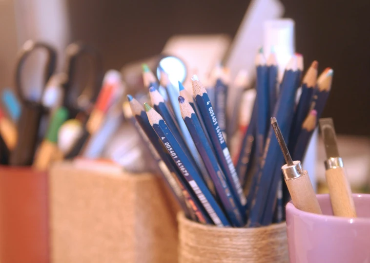 the office supplies are lined up together