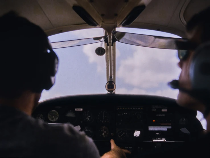 a man that is sitting in a plane