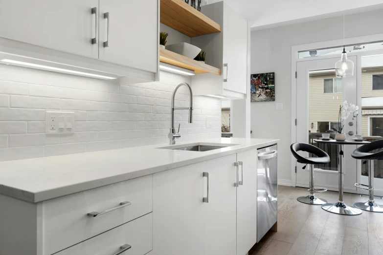 kitchen with a sink and a window in the center