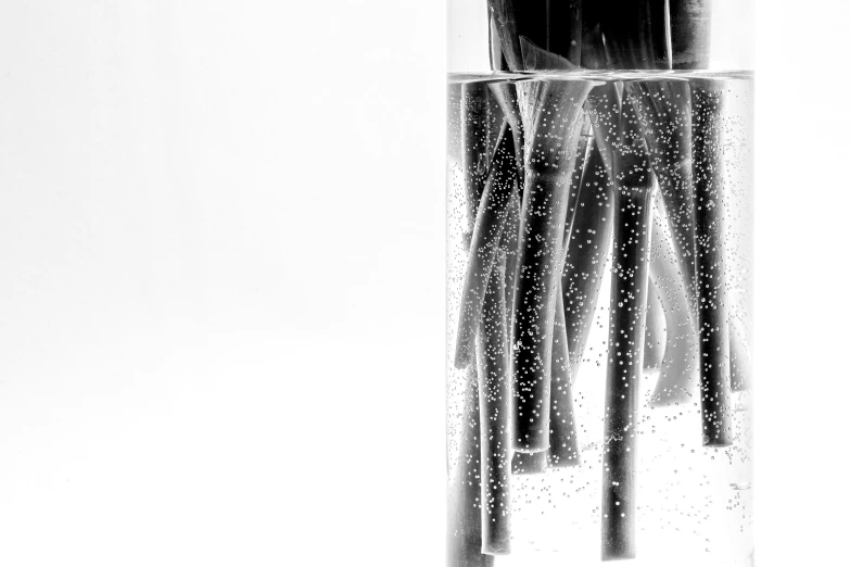 a person looking outside through a clear rain shower