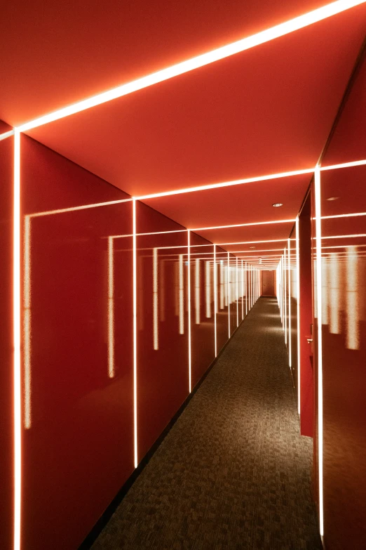 a long hallway lined with white lights